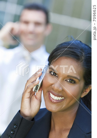 Beautiful Young Asian Woman On Her Cell Phone 7096625