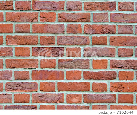 Brick wall background with red bricks 7102044