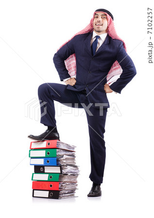 Arab businessman with many folders on white Arab businessman with many folders on white 7102257