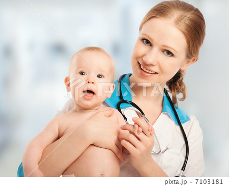Pediatrician woman doctor holding patient baby 7103181