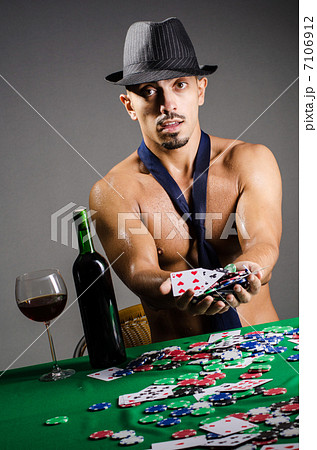 Naked broke businessman in casino 7106912