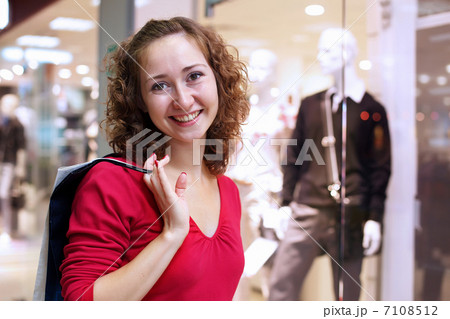 Young woman doing shopping Young woman doing shopping 7108512
