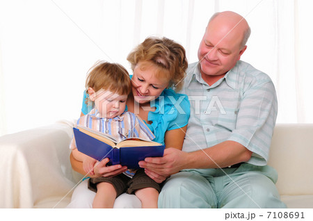 Grandmother, grandfather and grandson 7108691