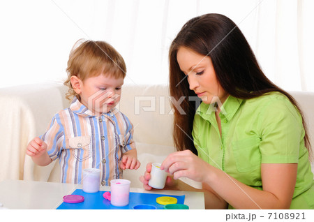 Mom and son having fun together Mom and son having fun together 7108921