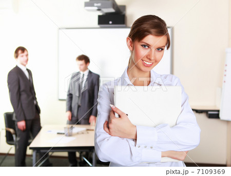 a young business woman in office 7109369