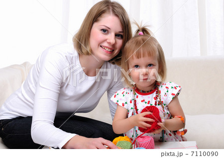 Young mother and her baby daughter Young mother and her baby daughter 7110090