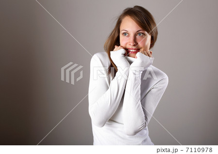 Young girl in white sweater Young girl in white sweater 7110978