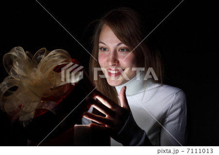 Young woman reading a magic book 7111013