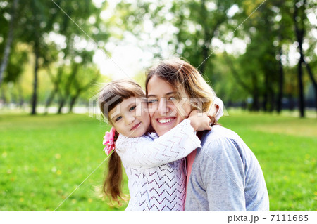 Mother and daughter in park Mother and daughter in park 7111685
