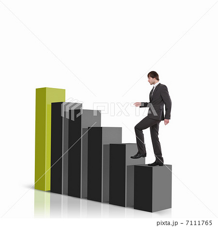 Businessman on Top of financial charts 7111765