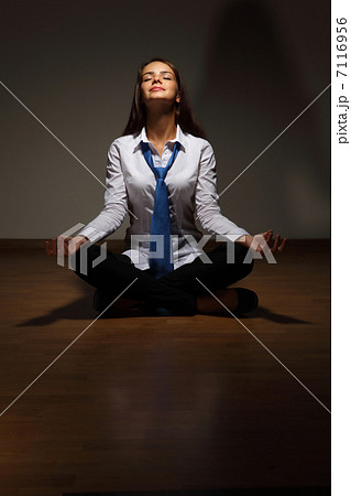Business woman meditating Business woman meditating 7116956