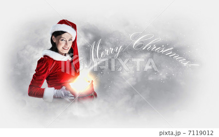 Attracive girl in santa clothes 7119012
