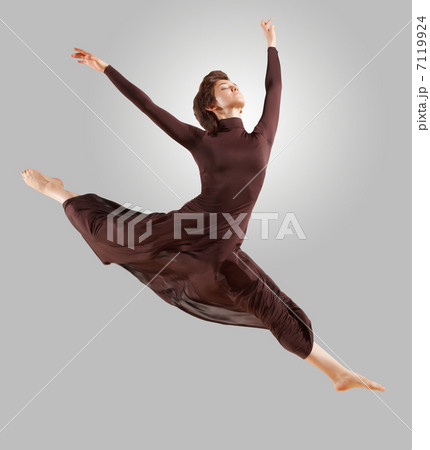 Girl in dark dress dancing Girl in dark dress dancing 7119924
