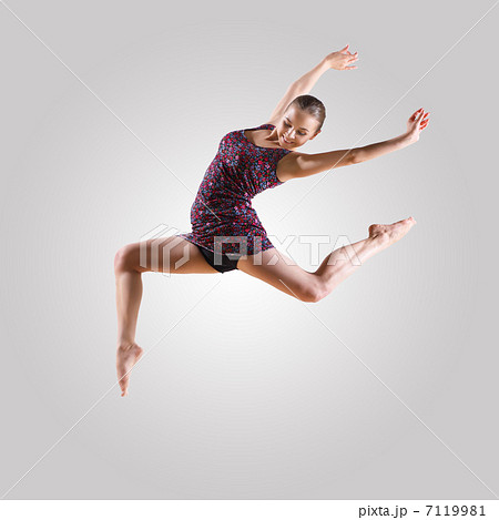 Girl in color dress dancing 7119981