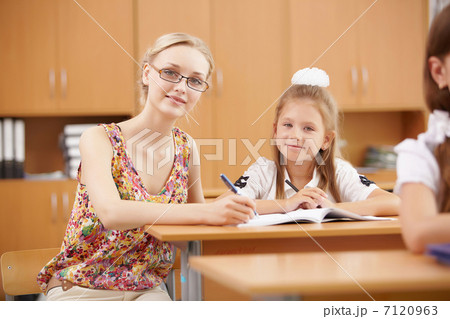 Teacher at school 7120963