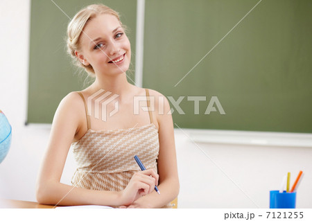 Teacher at school 7121255