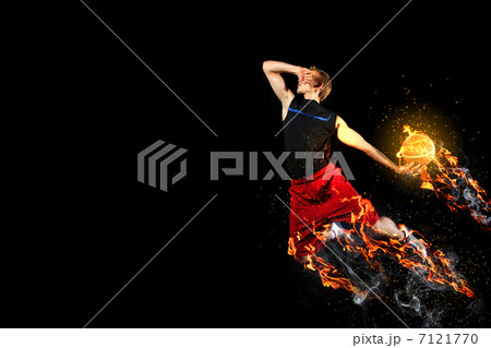 Basketball player with a ball Basketball player with a ball 7121770