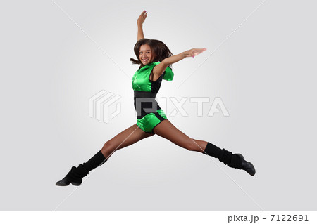 Young female dancer against white background 7122691