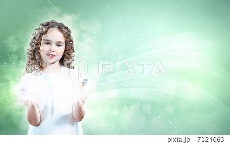 Child with magic light 7124063