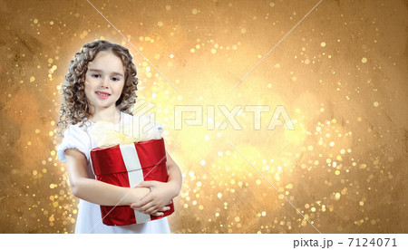 Happy girl opening gift box Happy girl opening gift box 7124071