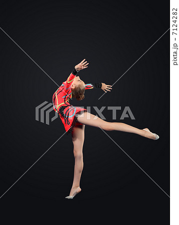 Young woman in gymnast suit posing Young woman in gymnast suit posing 7124282