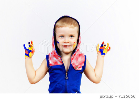 happy child with paint on the hands happy child with paint on the hands 7125656