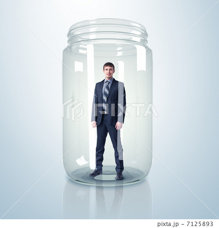 Businessman inside glass jar Businessman inside glass jar 7125893
