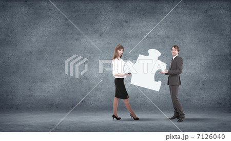 Piece of puzzle and business persons 7126040