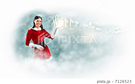 Portrait of girl wearing santa claus clothes Portrait of girl wearing santa claus clothes 7126523