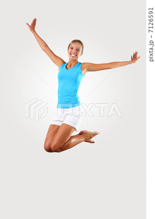 fitness woman jumping excited 7126591