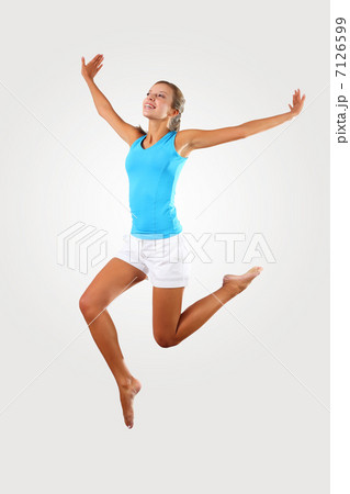 fitness woman jumping excited fitness woman jumping excited 7126599