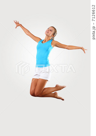 fitness woman jumping excited 7126612