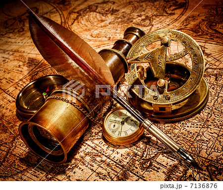 Vintage items on ancient map. 7136876