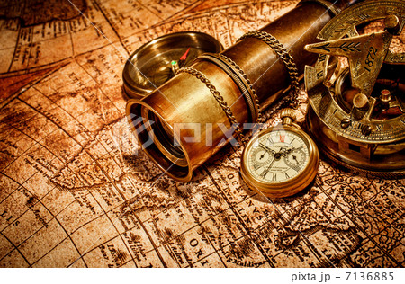 Vintage items on ancient map. 7136885