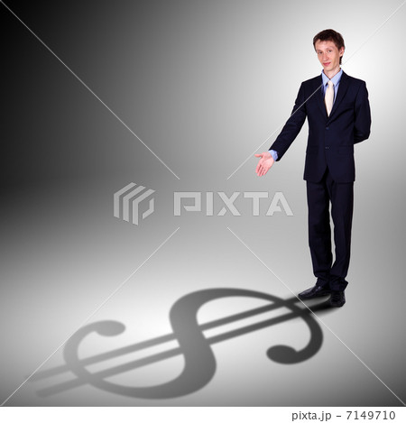 Businessman with shadow as a currency symbol Businessman with shadow as a currency symbol 7149710