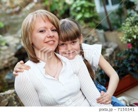 young mother with her little daughter 7150341