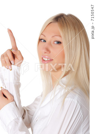 Young smiling blonde in a white shirt Young smiling blonde in a white shirt 7150547