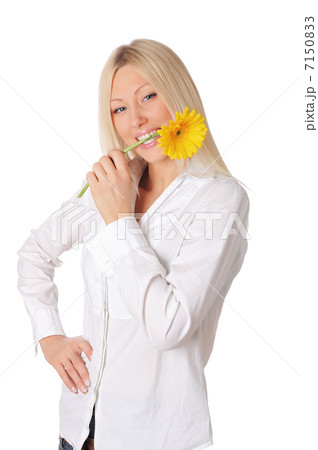 Young smiling blonde in a white shirt Young smiling blonde in a white shirt 7150833