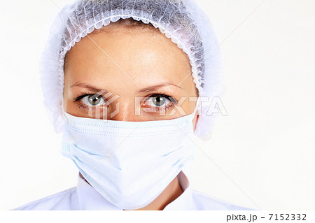 Young female scientist wearing face mask Young female scientist wearing face mask 7152332