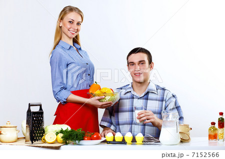 Husband and wife together coooking at home Husband and wife together coooking at home 7152566