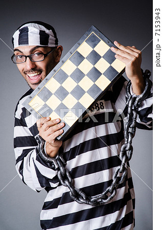 Convict criminal in striped uniform Convict criminal in striped uniform 7153943
