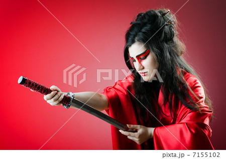 Female sword warriod in dark studio Female sword warriod in dark studio 7155102