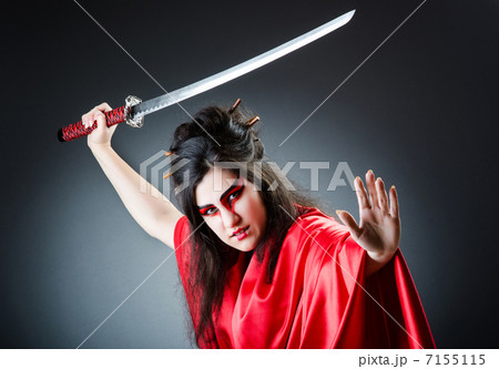 Female sword warriod in dark studio Female sword warriod in dark studio 7155115