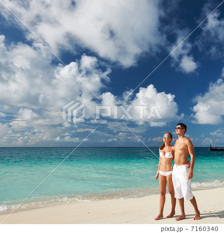 Couple on a beach at Maldives Couple on a beach at Maldives 7160340