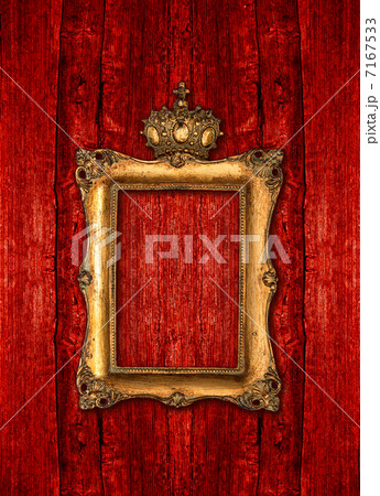 golden frame with crown over red wooden background golden frame with crown over red wooden background 7167533