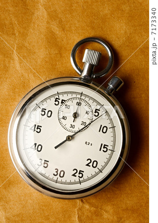 Stopwatch on paper background 7173340