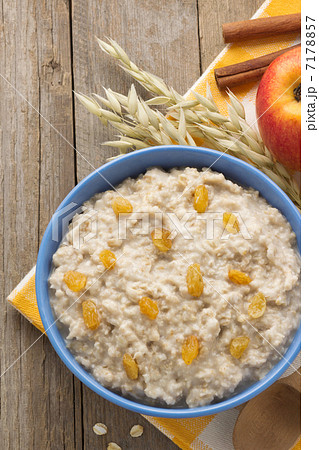 bowl of oatmeal on wood 7178857