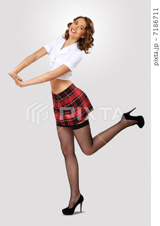 Young pretty woman dressed in retro style 7186711