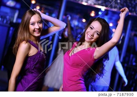 Young woman having fun at nightclub disco Young woman having fun at nightclub disco 7187930