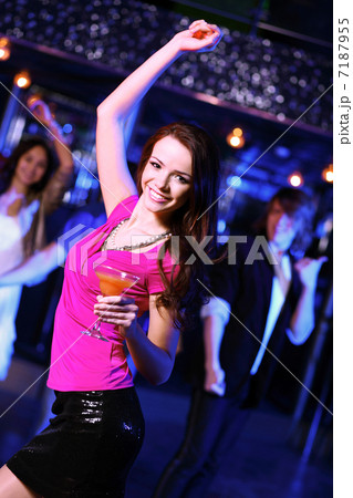 Young woman having fun at nightclub disco Young woman having fun at nightclub disco 7187955